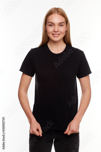 beautiful blond female posing with a blank black t-shirt. Ready for your design or artwork.