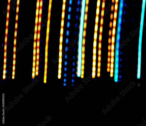 Colorful light trails with motion effect. Abstract background.