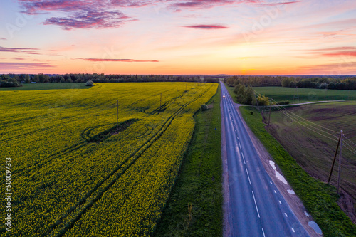 Empty Countryside Highway Road on Warm Summer Evening in Sunset Colors