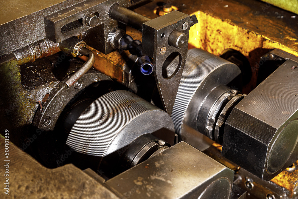 Metal processing machine. Detail of a tool in production Metal processing machine. Detail of a tool in production