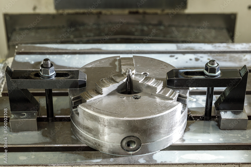 Metal processing machine. Detail of a tool in production Metal processing machine. Detail of a tool in production