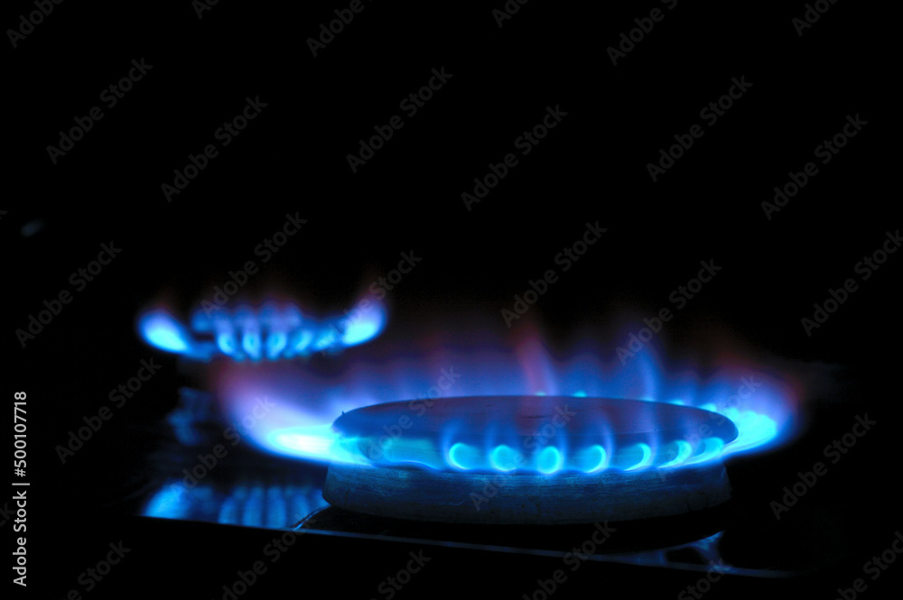 gas burner with burning gas. dark background gas burner with burning gas. dark background