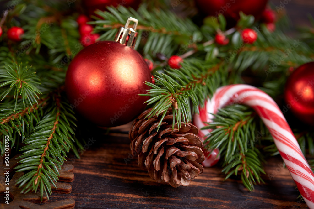 Christmas decoration with ball and fir branches