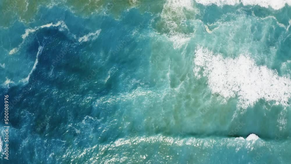 Stormy waves of Ocean crashing into the water