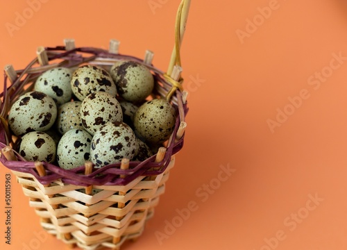 quail eggs in a basket, with selective focus