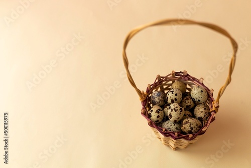 quail eggs in a basket, with selective focus