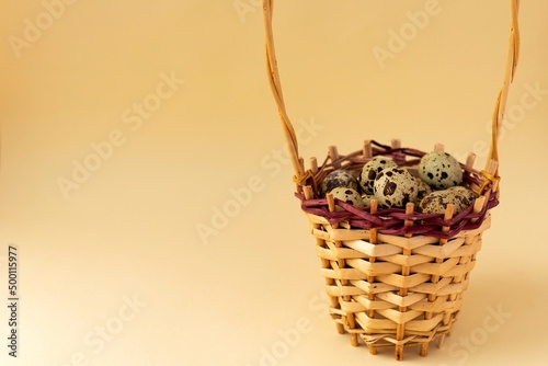 quail eggs in a basket, with selective focus