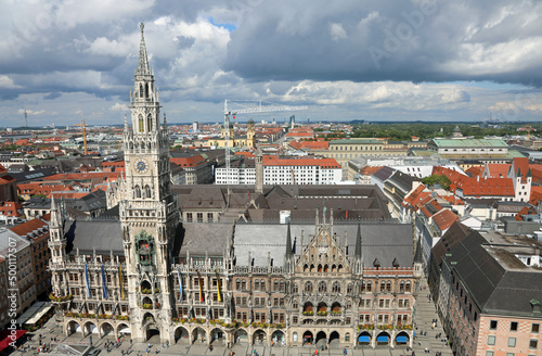 new town hall of the city of munich in germany and the top view of the houses