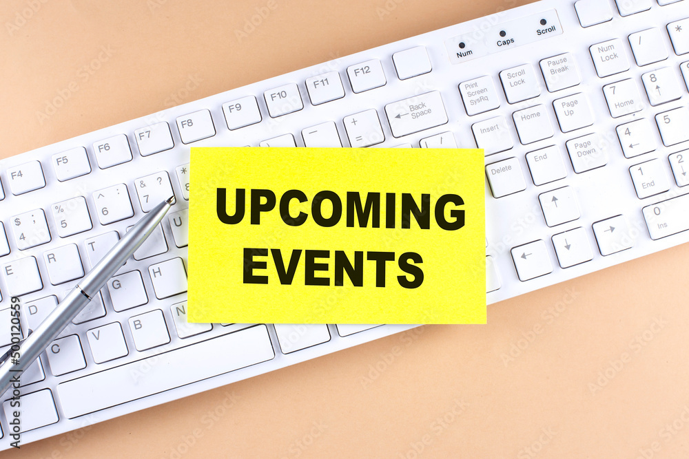 Text UPCOMING EVENTS text on a sticky on keyboard, business concept Text UPCOMING EVENTS text on a sticky on keyboard, business concept