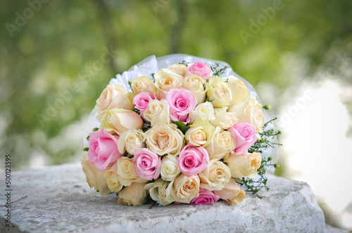 Delicate wedding bouquet of white and pink roses. Bride s bouquet.