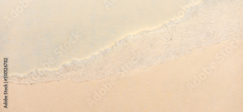 Macro close up of a torn manila folder edge texture