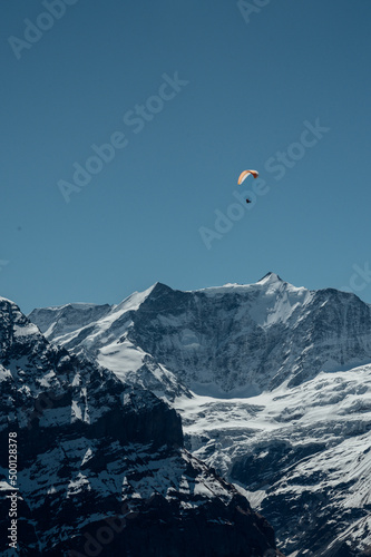 paraglider over the mountains