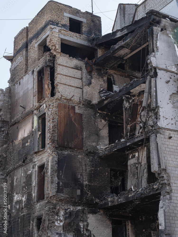 Destroyed buildings after the bombing, close-up. War in Ukraine 2022