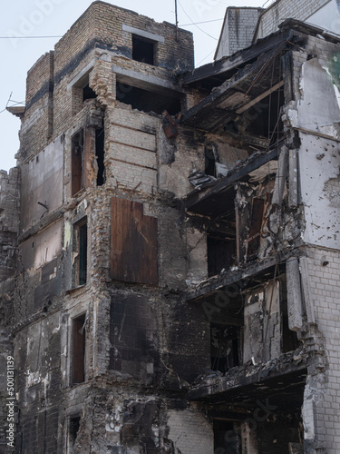Destroyed buildings after the bombing, close-up. War in Ukraine 2022 © Sid10
