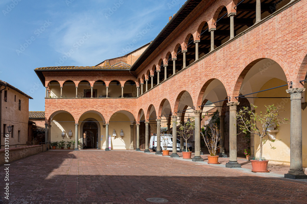 Fototapeta premium House-Sanctuary of Saint Catherine in Siena, Tuscany, Italy. Courtyard with portico of the Sanctuary of Santa Caterina.