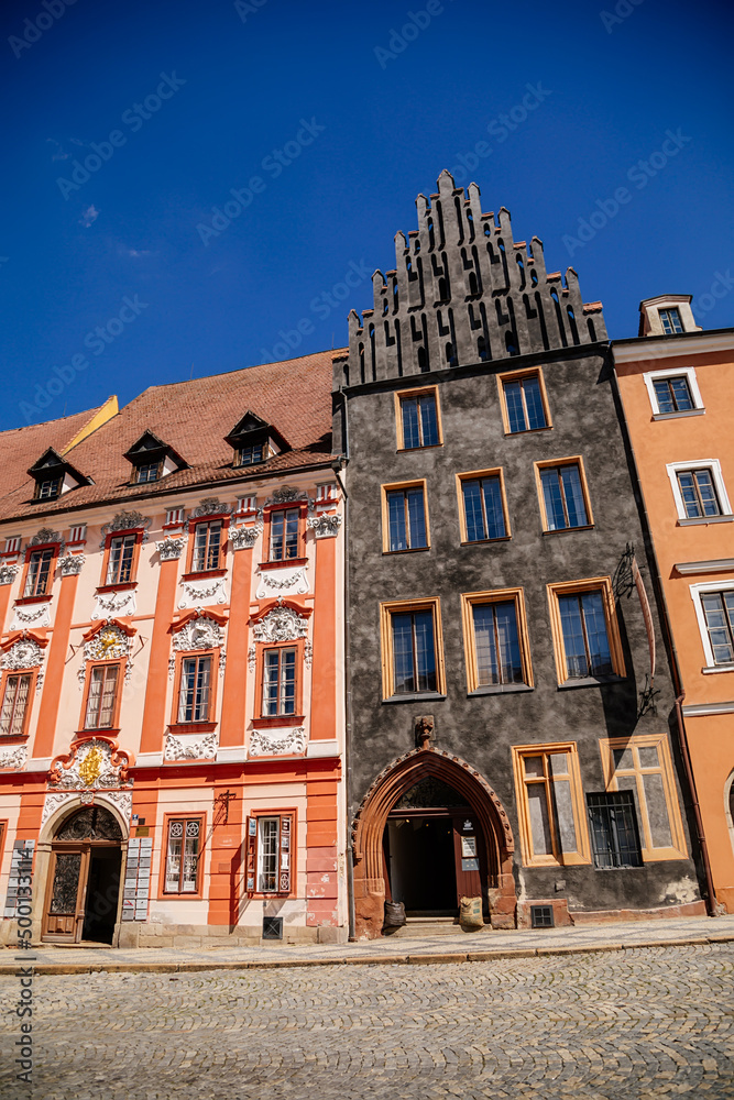 Obraz premium Cheb, Western Bohemia, Czech Republic, 14 August 2021: King George of Podebrady Square, Eger at sunny summer day, medieval colorful gothic merchant, historic renaissance and baroque buildings