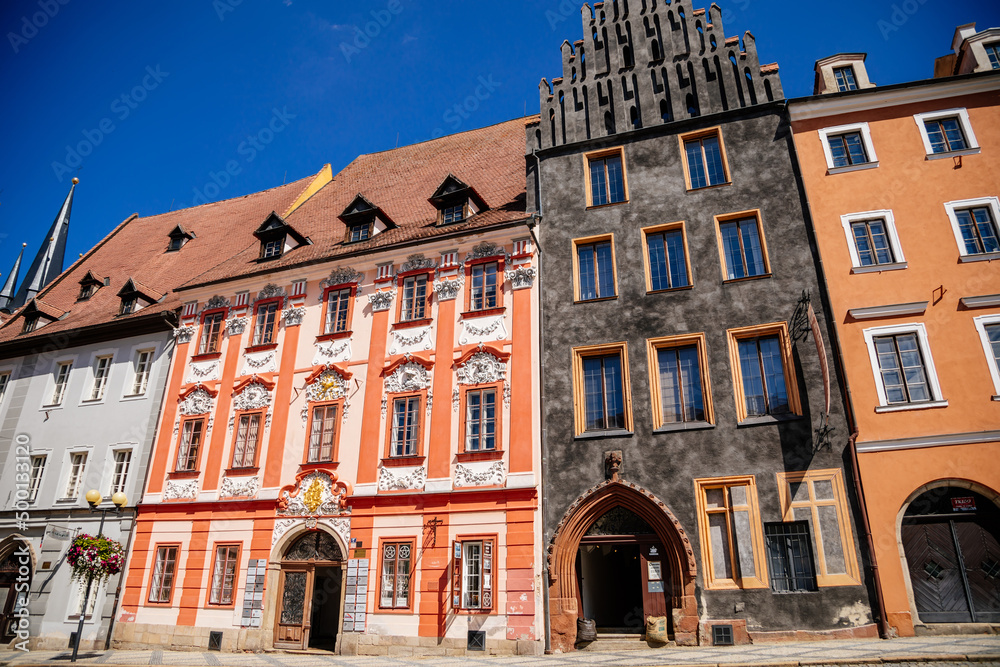 Cheb, Western Bohemia, Czech Republic, 14 August 2021: King George of Podebrady Square, Eger at sunny summer day, medieval colorful gothic merchant, historic renaissance and baroque buildings