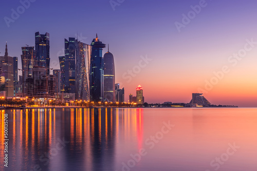 Doha Skyline view early morning. Doha Corniche beach © hasan