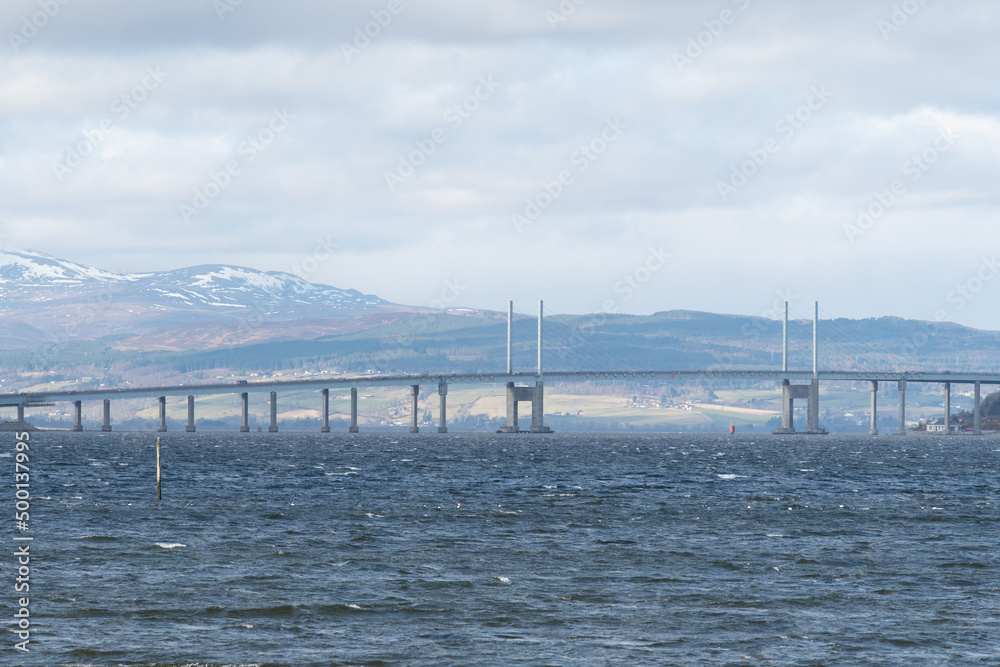 Kessock Bridge along A9 road across the Beauly Firth at Inverness, Scotland. The bridge takes cars from Inverness to the Black Isle. Soft focus.