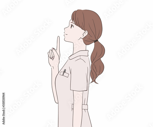 人差し指を立てる横を向いた看護師