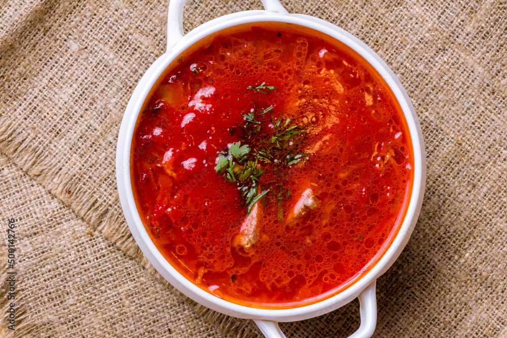 Borscht with sour cream on the bowl top view Borscht with sour cream on the bowl top view