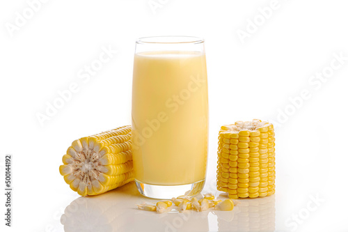 Glass of sweet corn juice and corn on white background.