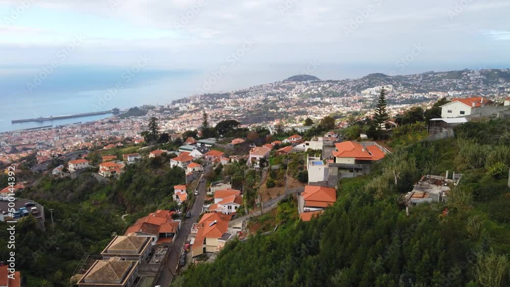 View from the cable car in Funchal. flying over buildings. View from the cable car in Funchal. flying over buildings.