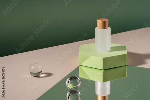 Cosmetic mockup on podium for product presentation. Showcase mock up for perfume advertising, cosmetics stand, branding scene with ball and mirror. Green backdrop with transparent sphere stylish props