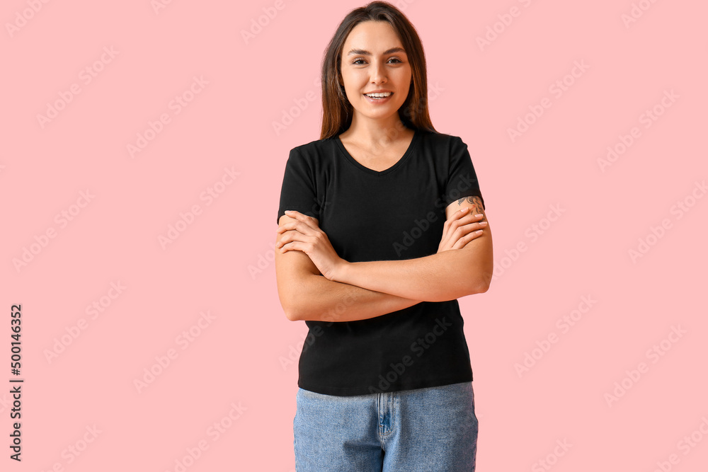 Young woman in blank t-shirt on color background Young woman in blank t-shirt on color background