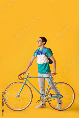 Male Asian student with bic...