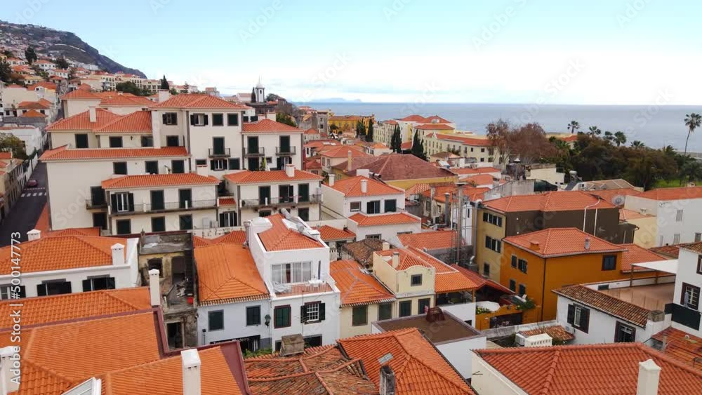 View from the cable car in Funchal. flying over buildings. View from the cable car in Funchal. flying over buildings.
