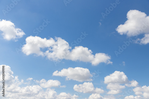 white cloud and blue sky background. hot day in summer. © Rattanachat