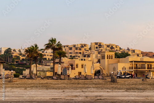 Ras Al Khaimah, UAE - 04.04.2022 - View of the beach and private villas at The Cove Rotana Resort. Holiday photo