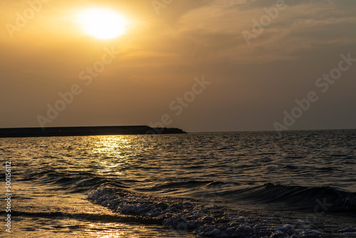 Shot of a dramatic sunset by the beach. Nature