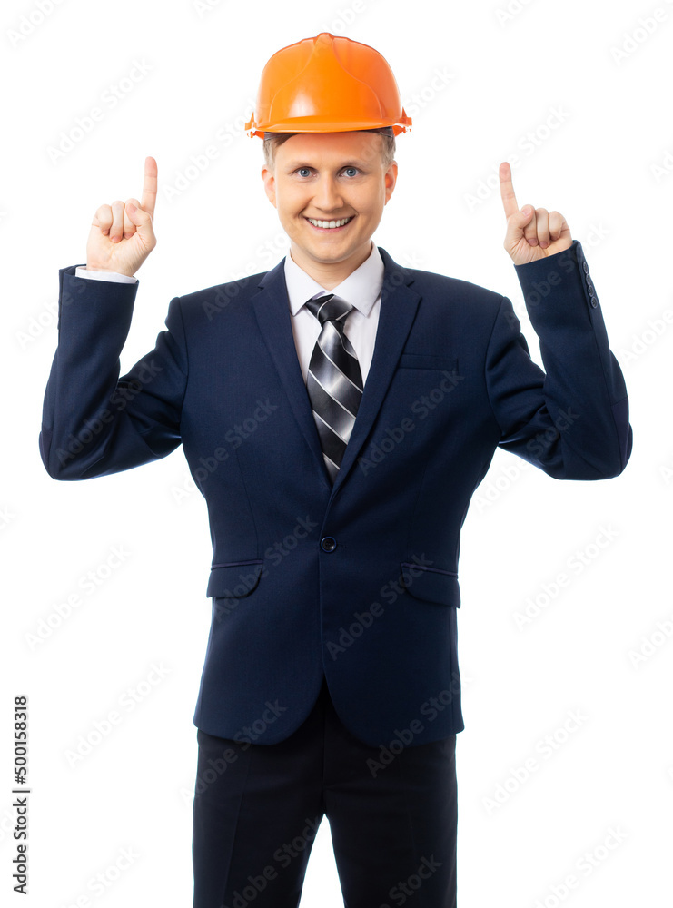Portrait of a man in a blue business suit with a tie and helmet points his finger in different directions: up, down, sideways, to the camera. place for an inscription. isolated. White background.