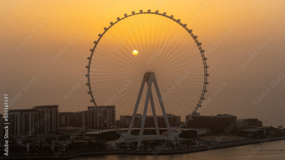 Dubai, United Arab Emirates. Amazing aerial view of the Ain Dubai at sunset. The world’s tallest and largest observation wheel. An iconic landmark close to Dubai Marina