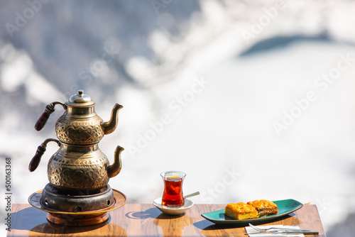 Turkish Tea and Laz Boregi in the Winter Season, Uzungol Lake, Caykara Trabzon Turkey © raul77