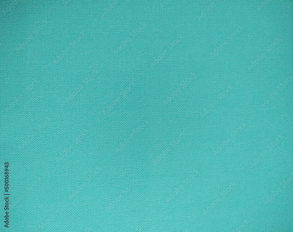 Textured canvas painted mint green background for decorative, surface canvas painted mint green background. Textured canvas painted mint green background for decorative, surface canvas painted mint green background.