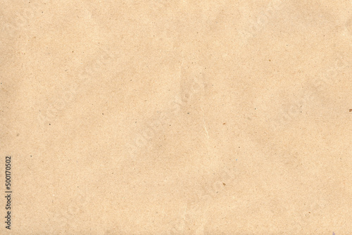Light brown kraft paper texture wallpaper. Paper background for desing