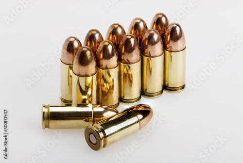 9 mm. gun bullets , Full metal jacket ammunition on white background photo