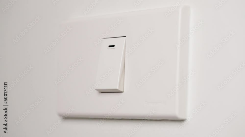 Finger pushing light switch turn on and turn off Saving electrical