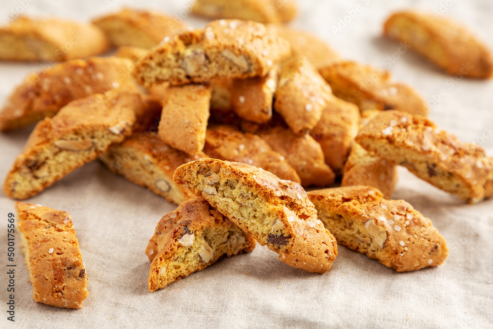 Homemade Italian Cantuccini with Almonds, side view. Crispy Almond Cookies. Close-up. Homemade Italian Cantuccini with Almonds, side view. Crispy Almond Cookies. Close-up.