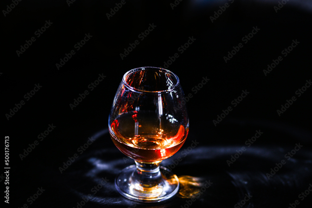 whiskey glass on a dark background whiskey glass on a dark background