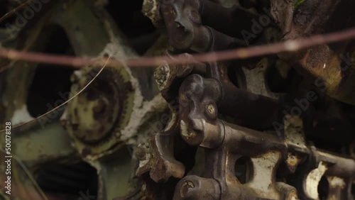 Abandoned rusty radioactive equipment of the soviet union. Cemetery of technology in Rassokha. Chernobyl. Ukraine photo