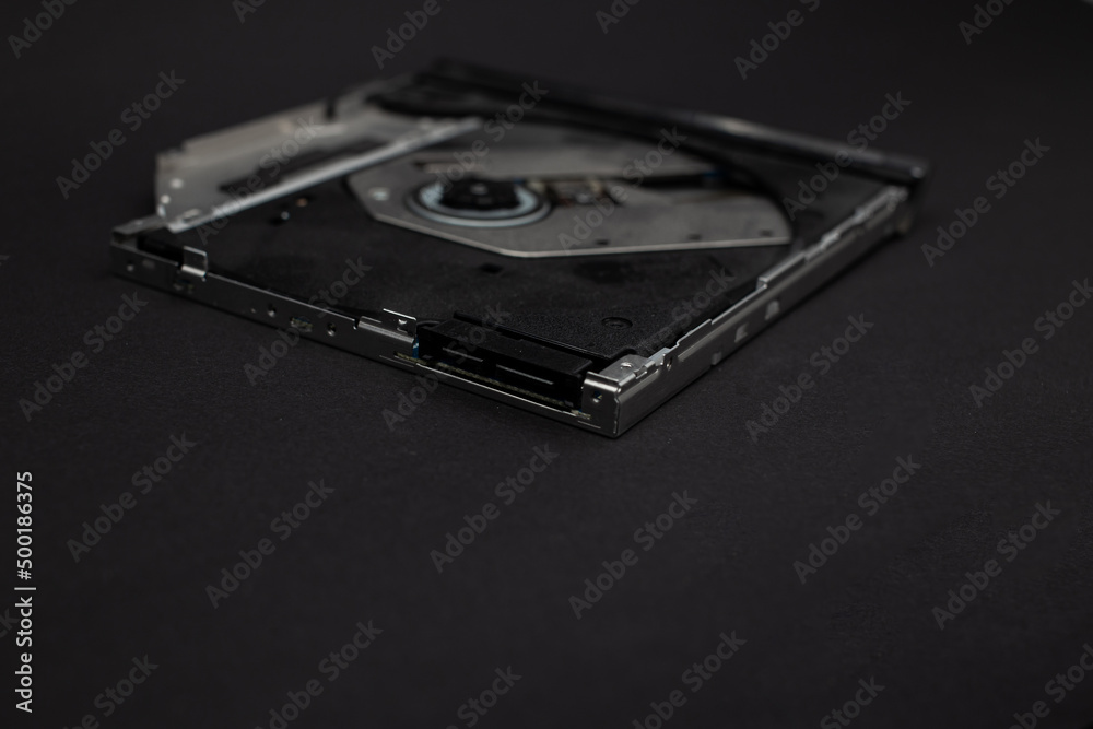 Laptop hard drive on black background Laptop hard drive on black background