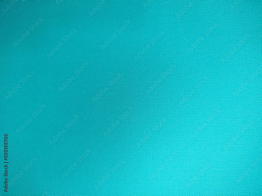 Texture canvas painted light blue background, surface canvas painted light blue as background. Texture canvas painted light blue background, surface canvas painted light blue as background.