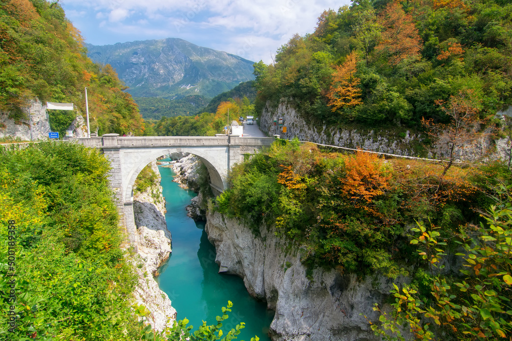 Fototapeta premium Amazing view of Soca river and Napoleon's bridge near Kobarid, Slovenia