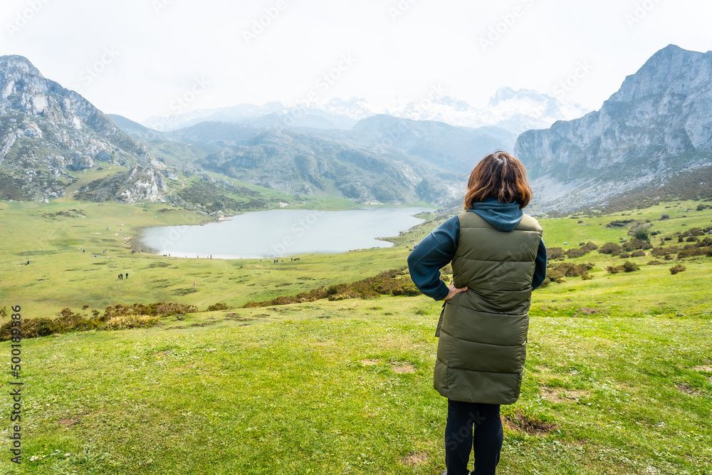 A young tourist at the Entrelagos viewpoint of Lake Ercina in the Lakes of Covadonga. Asturias. Spain