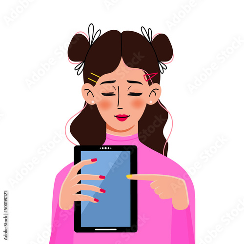 Young girl woman with a tablet computer in her hands.