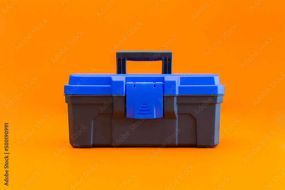 black blue toolbox with orange background black blue toolbox with orange background